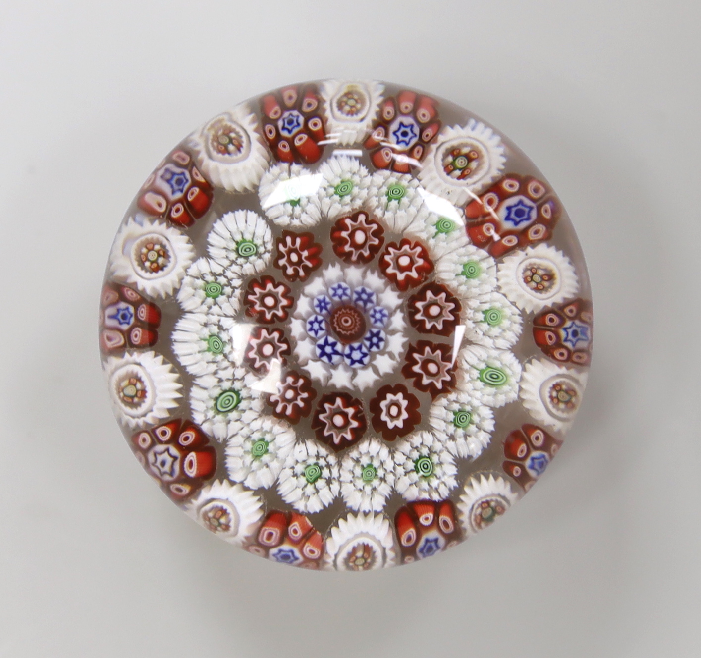 A Baccarat concentric millefleur cane paperweight, approximate diameter 4.25